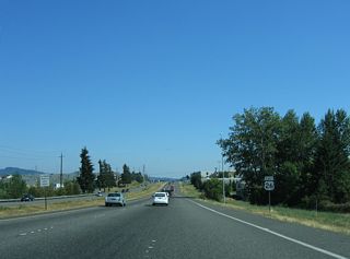 Confirming marker posted east of the entrance ramp from NW 185th Avenue at Hillsboro.