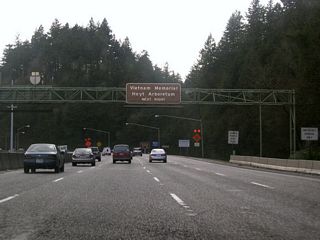 Departing from the Vista Ridge Tunnel at Washington Park, westbound Sunset Highway climbs a moderate grade to Sylvan Hill.