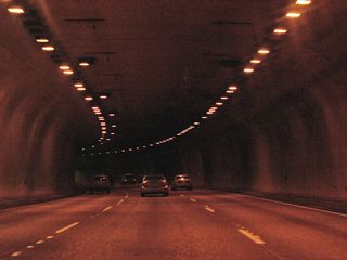 The Vista Ridge Tunnel constitutes a pair of three lane tubes without shoulders.