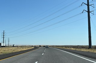 The adjacent power line corridor switches sides with Interstate 82 southward into Umatilla Army Depot.