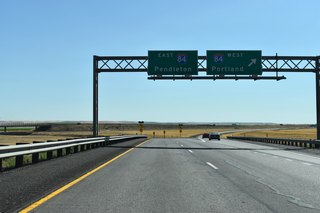I-82 eastbound defaults onto I-84 east to Pendleton. U.S. 30, omitted on guide signs from I-82, overlaps with I-84, 30 miles east to Pendleton and 93 miles west to The Dalles.