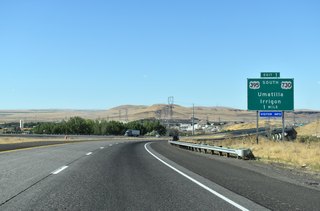 One mile south of the diamond interchange (Exit 1) with U.S. 395 south / U.S. 730 (Sixth Street) in Umatilla. U.S. 395 north combines with Interstate 82 west to cross the Columbia River.