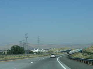 Several sets of powerlines pass over Interstate 82 as the freeway spans the Umatilla River.