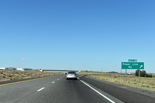 Powerline Road derives its name from the set of transmission lines that parallel I-82 to the south. That set of lines follows Powerline Road into south Umatilla before turning eastward again over I-82 at the Umatilla River.