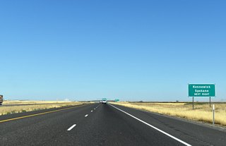 I-84 / U.S. 30 east next connect with I-82 west to Washington state. The freeway joins northern Oregon with Kennewick in the Tri-Cities region. U.S. 395 continues northeast from I-82 to Spokane along I-90. 