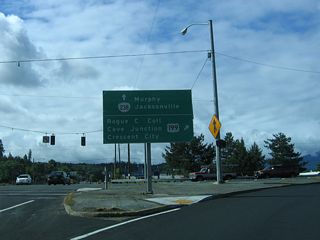 OR 238 (Jacksonville Highway) comprises a 38.75 mile long loop south between U.S. 199 at Grants Pass and OR 62/99 in Medford. Southwest from Grants Pass, U.S. 199 leads to Rogue Community College, Cave Junction, Oregon Caves National Monument, and U.S. 101 at Crescent City, California.