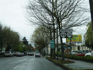 Removed by 2008, reassurance markers for OR 99 north and OR 126 Business west were previously posted along 6th Avenue after High Street.