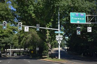 OR 126 eastbound joins I-105 to cross the Jefferson-Washington Street Bridge over the Willamette River. The route extends east into Springfield along a freeway to 52nd Street.