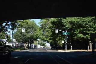 An exit ramp joins the west end of I-105 with 6th Avenue beyond Jefferson Street.