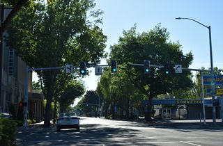 OR 99/126 Business (W 7th Avenue) east at Charnelton Street.