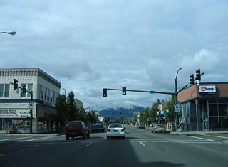 OR 99 (6th Street) south at I Street.