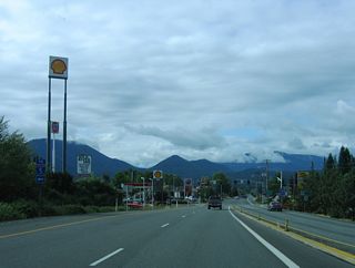 Scoville Road south becomes OR 99 at the ramps (Exit 58) with Interstate 5. OR 99 partitions into the couplet of NW 6th Street south and NW 7th Street ahead of Morgan Lane in Grants Pass.