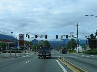 Motorist services such as gas stations, restaurants and hotels line both directions of OR 99 along 6th and 7th Streets through north Grants Pass. Morgan Lane east leads directly onto the entrance ramp for I-5 south.