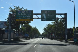 Interstate 105 begins north from OR 99/126 (W 7th Avenue) in a half mile at Washington Street.