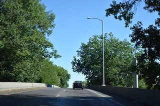 Interstate 105 initially rises onto a viaduct over Washington Jefferson Park and a pair of railroad lines on the 3.49 mile long course north and east through Eugene.