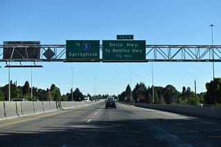One half mile ahead of a trumpet interchange joining I-105 / OR 126 with Delta Highway (OR 132). The entire Eugene-Springfield Highway is also named Officer Chris Kilcullen Memorial Highway, dedicated to the Eugene policeman who lost his life during a routine traffic stop in 2011.