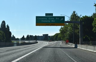 A split diamond interchange joins Interstate 105 / OR 126 with Country Club Road and Coburg Road. Coburg Road extends south to Downtown Eugene and northeast to Belt Line Highway (OR 569).