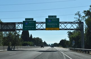 I-105 concludes one mile ahead at a systems exchange with I-5 near Springfield. Locally, I-5 serves as the primary freeway between Goshen to the south and Coburg to the north.