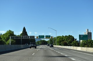 The freeway passes over Washington Jefferson Park on the ensuing stretch to OR 99 (W 6th / 7th Avenues). OR 99 through the city of Eugene is designated as a truck route. 