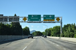 OR 126 travels west with OR 99 from the end of I-105 to Garfield Street, where it travels south to W 11th Avenue. OR 126 leaves Eugene along W 11th Avenue on a 58.3 mile course through Siuslaw National Forest to U.S. 101 at Florence.