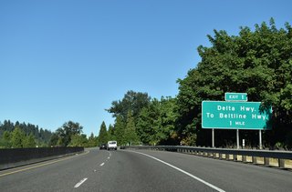 I-105 / OR 126 pass over Coburg Road (Exit 2) one mile out from a trumpet interchange with Delta Highway (Route 132) to northern reaches of Eugene.