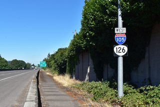 The lone shield assembly for I-105 / OR 126 along westbound is located beyond the systems exchange with Interstate 5. 