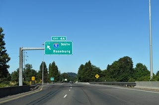 Left Exit 4 B departs for Interstate 5 south to Goshen and Roseburg. Beyond Roseburg, I-5 continues along a southerly course to Grants Pass and Medford before entering northern California.