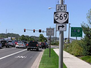 OR 126 (W 11th Avenue) intersects the west end of OR 569 (Beltline Road) by the site of the former Eugene Speedway in west Eugene. OR 569 is a freeway north from Roosevelt Boulevard and east to I-5 at Springfield.
