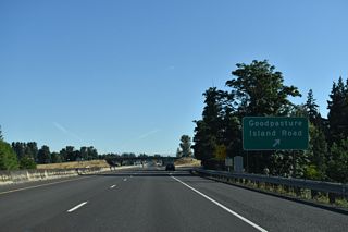 Goodpasture Island Road runs north from the Valley River Center to Delta Ponds park before arcing east to a parclo interchange with OR 132 (Delta Highway).