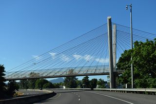 The Delta Ponds pedestrian Bridge crosses OR 132 along the south side of Delta Ponds park.