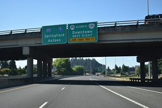 Two lanes default from OR 132 south onto I-105/OR 126 east to Autzen Stadium and Springfield. A slip ramp joins the second entrance ramp from Valley Center Drive that connects to I-105/OR 126 south to OR 99/126 Business (7th/6th Avenues) west of Downtown Eugene.
