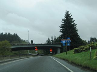 Trailblazers for I-5/105 on the ramp to I-105/OR 126 east were replaced with a 50 mph curve sign by 2018.