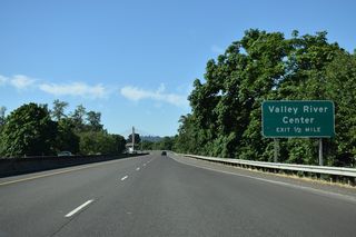 OR 132 (Delta Highway) continues south across Delta Ponds park on the half mile leading to the folded diamond interchange with Valley River Drive.