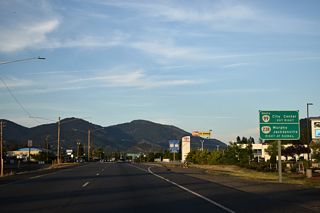 U.S. 199 (Redwood Highway) converges with OR 238 (Williams Highway) and OR 99 (Rogue River Highway) at a grade separated intersection in Grants Pass.