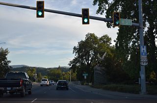 Turning south through an S-curve, U.S. 199 spans the Central Oregon &amp; Pacific Railroad ahead of M Street.