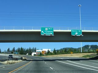U.S. 26 originates 69 miles to the west at a trumpet interchange with U.S. 101 near the Oregon Coast.