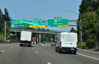 A two lane ramp leaves at Exit 1 D for U.S. 26 west to the Oregon coast and SW 12th Avenue north. Providence Park stadium is located four blocks west of I-405 at Exit 2 A to SW 14 Avenue / SW Salmon Street next.