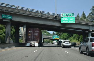 Exit 1 D also connects to SW 12 Avenue north to western reaches of City Center. This overhead was replaced a sign referencing the zoo and forestry center after 2007.