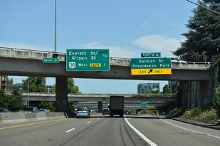The couplet of SW Market and Clay Streets tie into the exchange between I-405 / U.S. 26 from City Center where Exit 2 A departs for SW 14th Avenue to SW Salmon Street. The couplet was formerly part of U.S. 26 prior to completion of the Vista Ridge Tunnels in 1970.
One mile separates I-405 from U.S. 30 west to Northwest Portland and St. Johns.