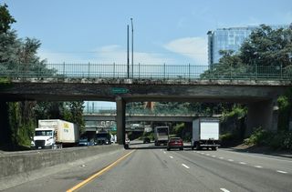 The below grade section of Interstate 405 north passing below Yamhill Street, Morrison Street and Alder Streets.