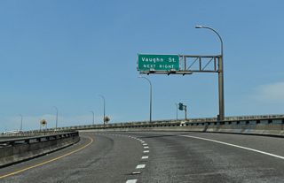 The lone exit from the freeway spur taking U.S. 30 north to Yeon Avenue departs for Vaughn Street at NW 23rd Avenue immediately after the flyovers from I-405 converge.