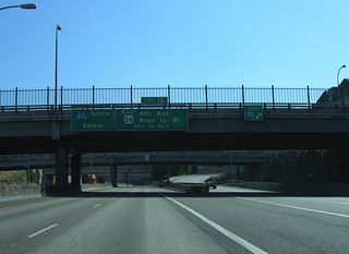 U.S. 26 east joins Interstate 405 south from Sunset Highway to SW Broadway. U.S. 26 continues from Exit 1 C along the locally maintained route of SW Broadway, 5th Avenue, Sheridan Street, 3rd Avenue and Arthur Street to Naito Parkway.