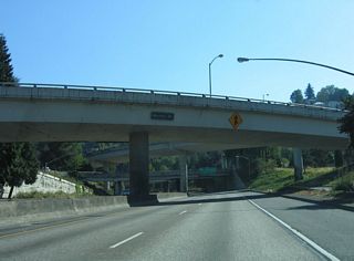 Market Street (old U.S. 26) splits from Sunset Highway east above Interstate 405 at the exchange with U.S. 26 (Sunset Highway).