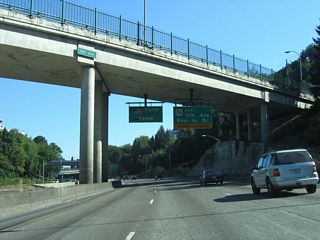 The busiest part of Interstate 405 is where traffic from U.S. 26 eastbound conflicts with entering traffic from Montgomery Street and exiting traffic to SW Broadway. Substantial traffic congestion ensues during peak rush hours. Lake Oswego, Southwest Portland, the Ross Island Bridge and Milwaukie are all accessed through Exit 1 C.