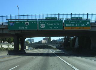 Exit 2 A ties into the intersection of NW 15th Avenue at Couch Street, one block north of Burnside Street. U.S. 26 (Sunset Highway) converges with the Stadium Freeway south next at a directional T interchange (Exit 1 D).