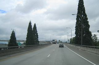 The northbound flyover taking U.S. 30 west from I-5 onto I-405 also includes a ramp stub for the unconstructed Rose City Freeway. Beyond the spur to Kerby Avenue at Cook Street, the Rose City Freeway never progressed beyond the planning stages.