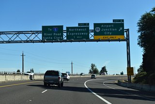 Heading northwest, OR 99 joins Beltline Highway with Eugene Airport (EUG) and Junction City.