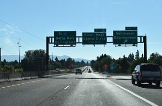 Exit 7 loops away from OR 569 east to Northwest Expressway. Northwest Expressway branches northwest from Chambers Street and River Road to the Irving neighborhood of Eugene, ending at Irvington Drive and Prairie Road.