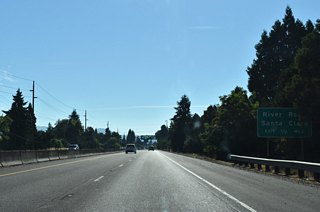 OR 569 meets River Road at a diamond interchange in one half mile. River Road joins Beltline Highway with the Eugene neighborhood of Santa Clara located north of the freeway.