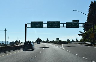 Originating from Chambers Street in the Whiteaker neighborhood, River Road angles northwest through unincorporated River Road into Santa Clara. Beyond OR 569 and Santa Clara, River Road continues northward to E 1st Avenue east of Junction City.
